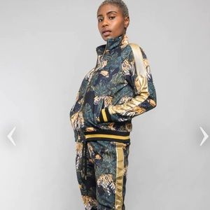 Brand new tiger print track suit with gold stripes